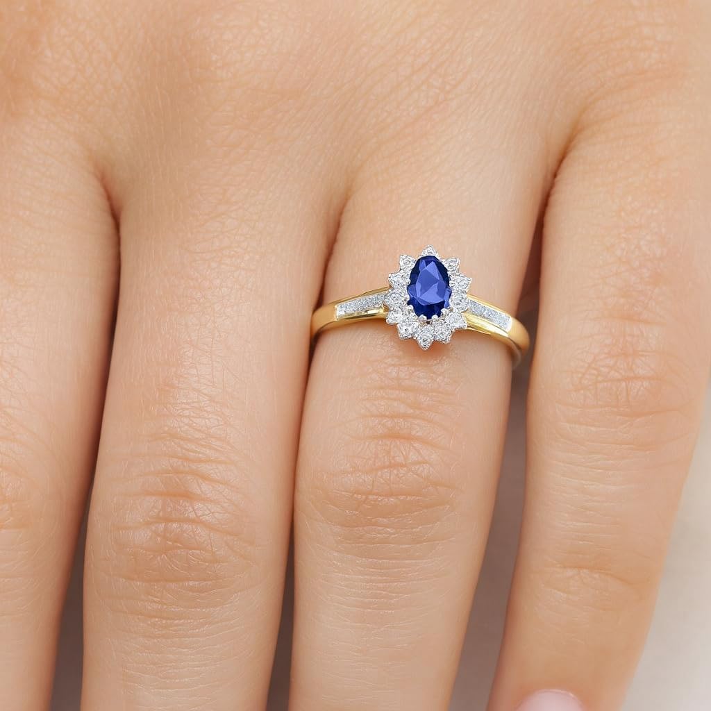 Naava Women's Sapphire and 12 Diamond Set Shoulders 9 ct Yellow Gold Ring - Size L