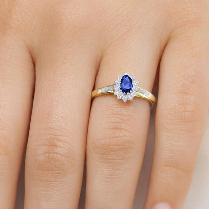 Naava Women's Sapphire and 12 Diamond Set Shoulders 9 ct Yellow Gold Ring - Size L